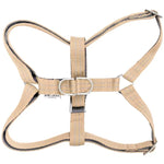 Beige dog harness on a white background