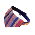 A multicolored checkered cat bandana with a blue collar, designed to fit over a cat collar.