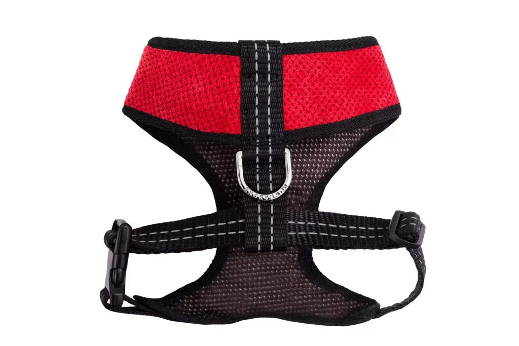 Red and black dog harness on a white background