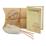 A set of cat toys designed to resemble mice, with a leather tail and natural wool felt body, tied with a string. The toys are displayed next to a novelty kraft pillow box with 'TOP SECRET' stamp and a classified document.